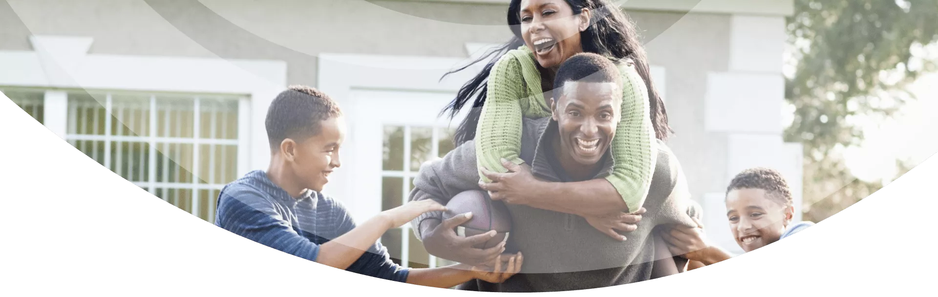 family playing football